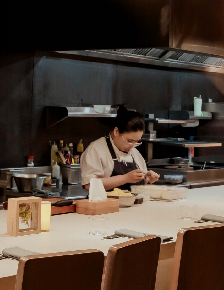 Chef working in open kitchen
